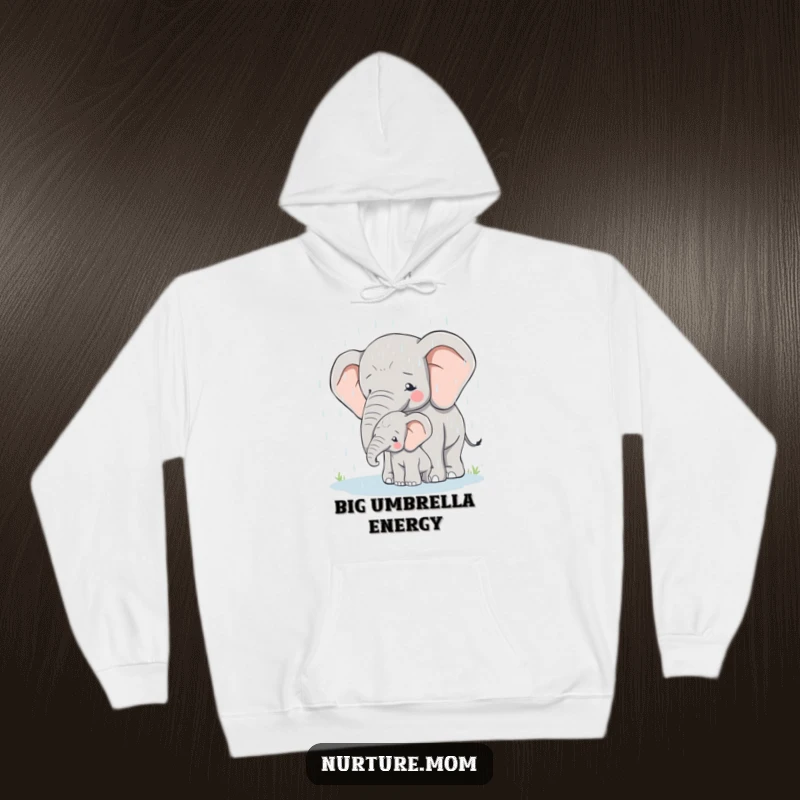 Hoodie design featuring a mother elephant shielding her calf from the rain, highlighting safety and comfort.