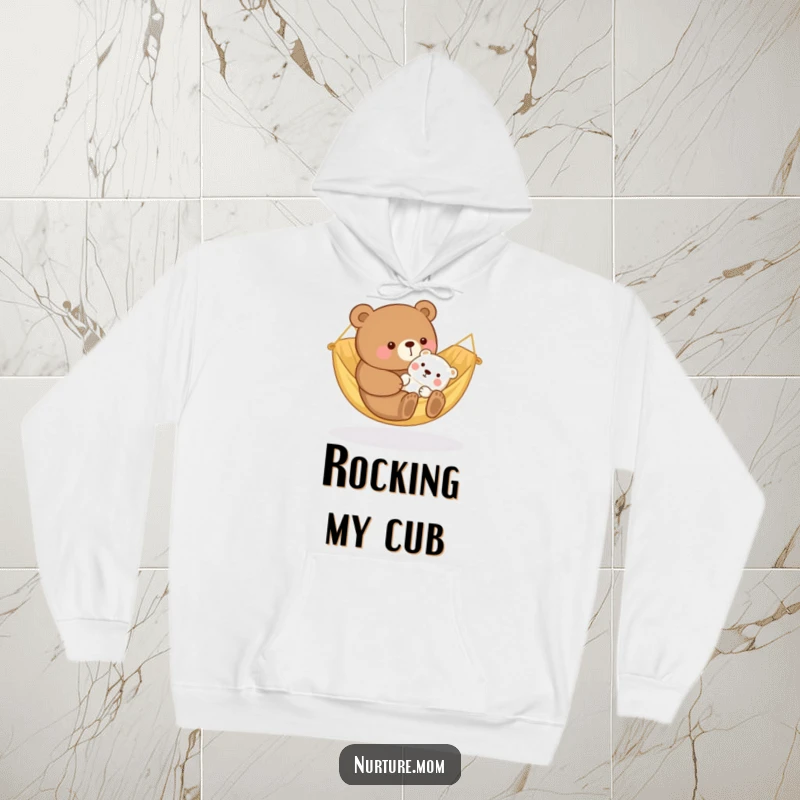 Funny kawaii bear mom rocking a baby animal in a cozy hammock, depicted on a soft and comforting hoodie.