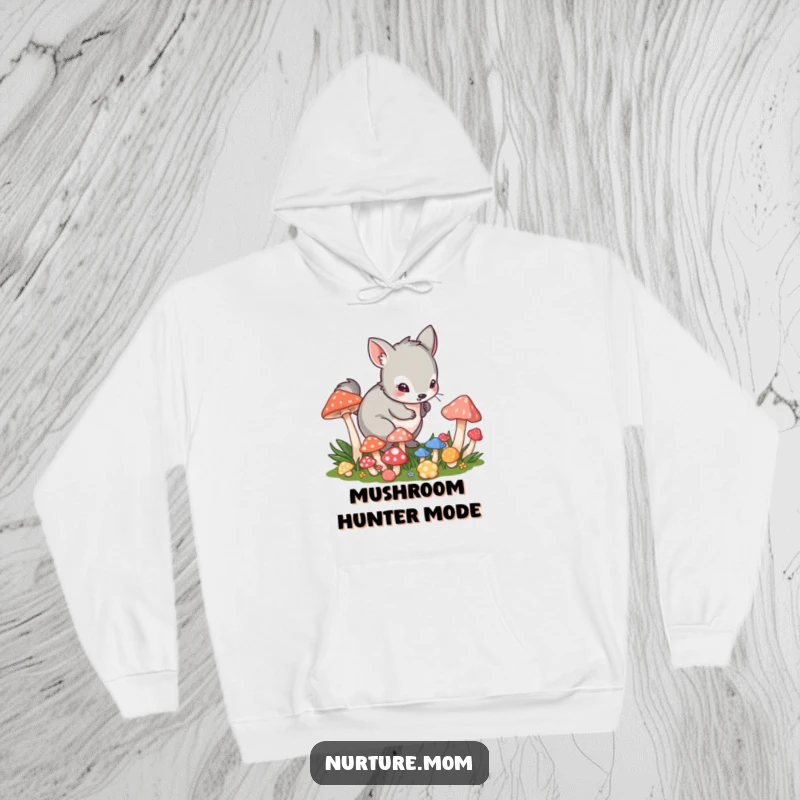 Funny hoodie depicting a small animal in a playful crouch tending to vibrant mushrooms, exuding fun and magic.