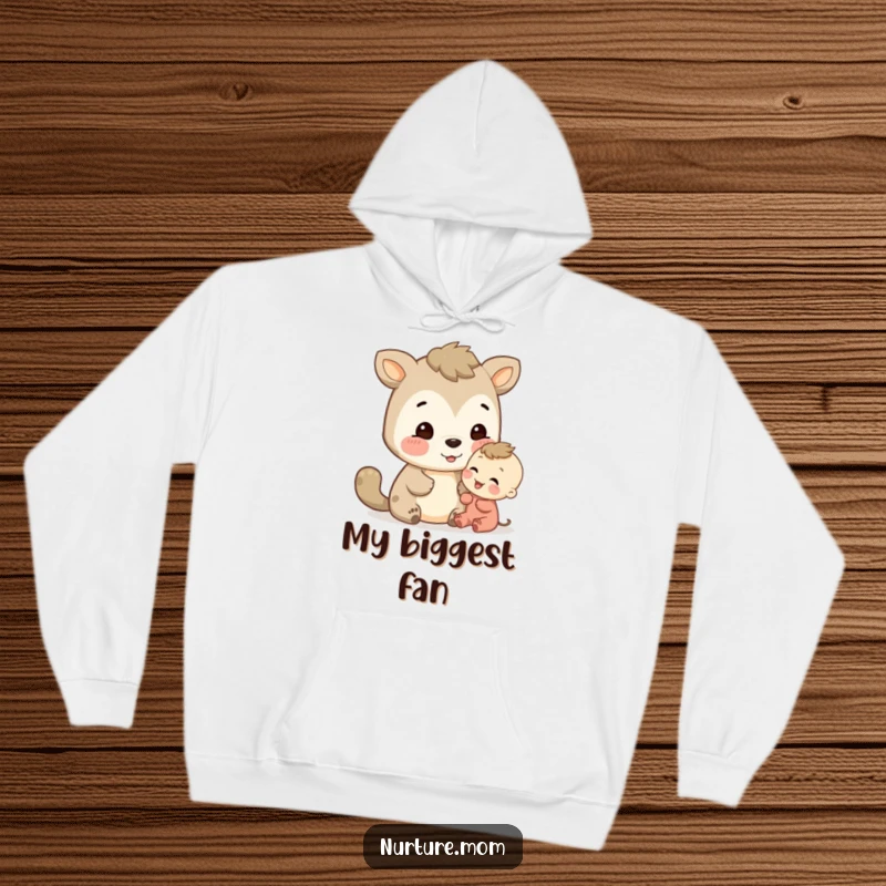 Funny animal offers a comforting, encouraging look to a small child, depicted on a cozy hoodie.