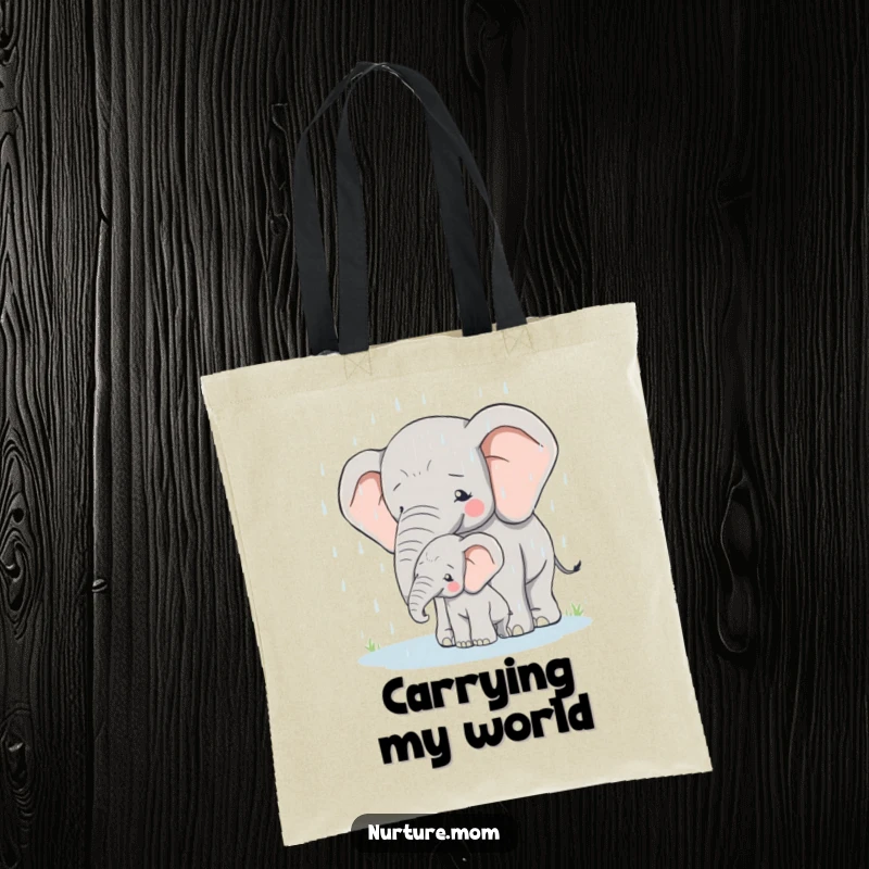 Tote bag print of a mother elephant protectively shielding her young calf from heavy rain.